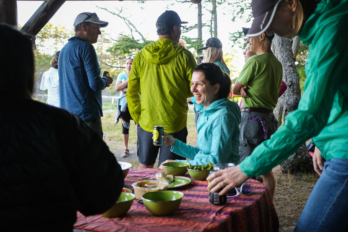 a happy runner is laughing amidst a large group